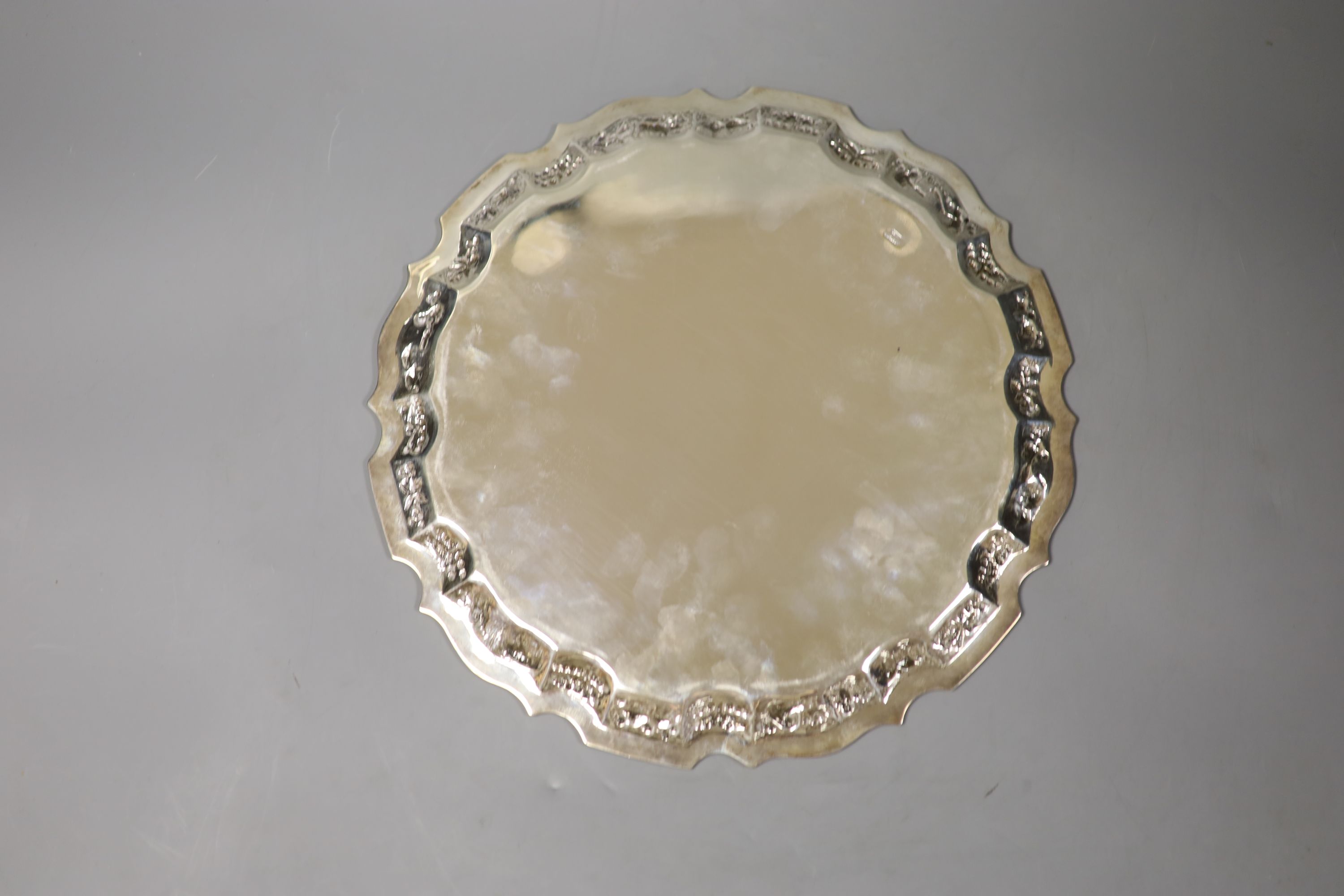 An Indian Sterling white metal salver engraved with signatures,